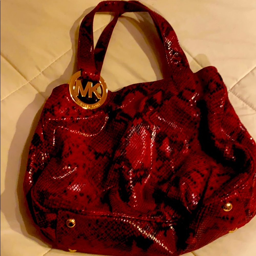 Authentic Michael Kors red handbag with dust cover